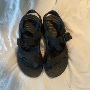 Womens black single strap chacos with a toe loop